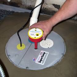 A newly installed sump pump system in a basement in Charles City