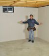 Toano basement insulation covered by EverLast™ wall paneling, with SilverGlo™ insulation underneath